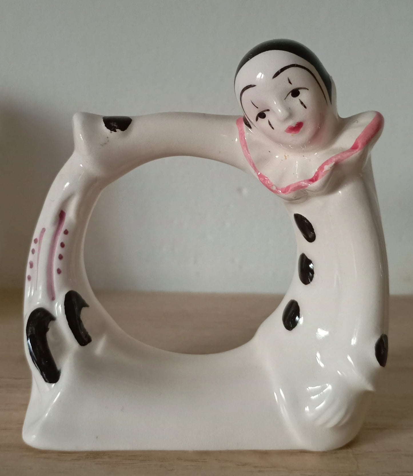 Four Pierrot napkin rings