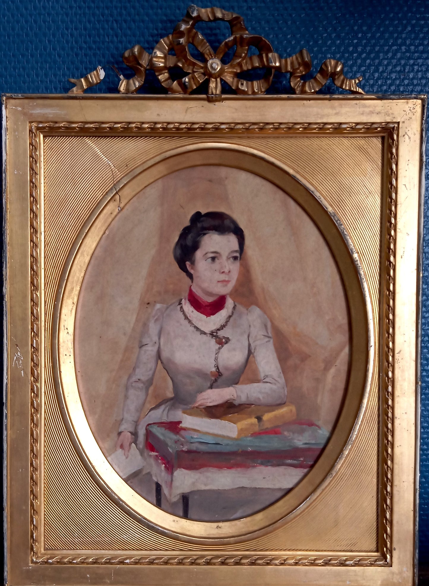 Portrait of an elegant woman holding a book