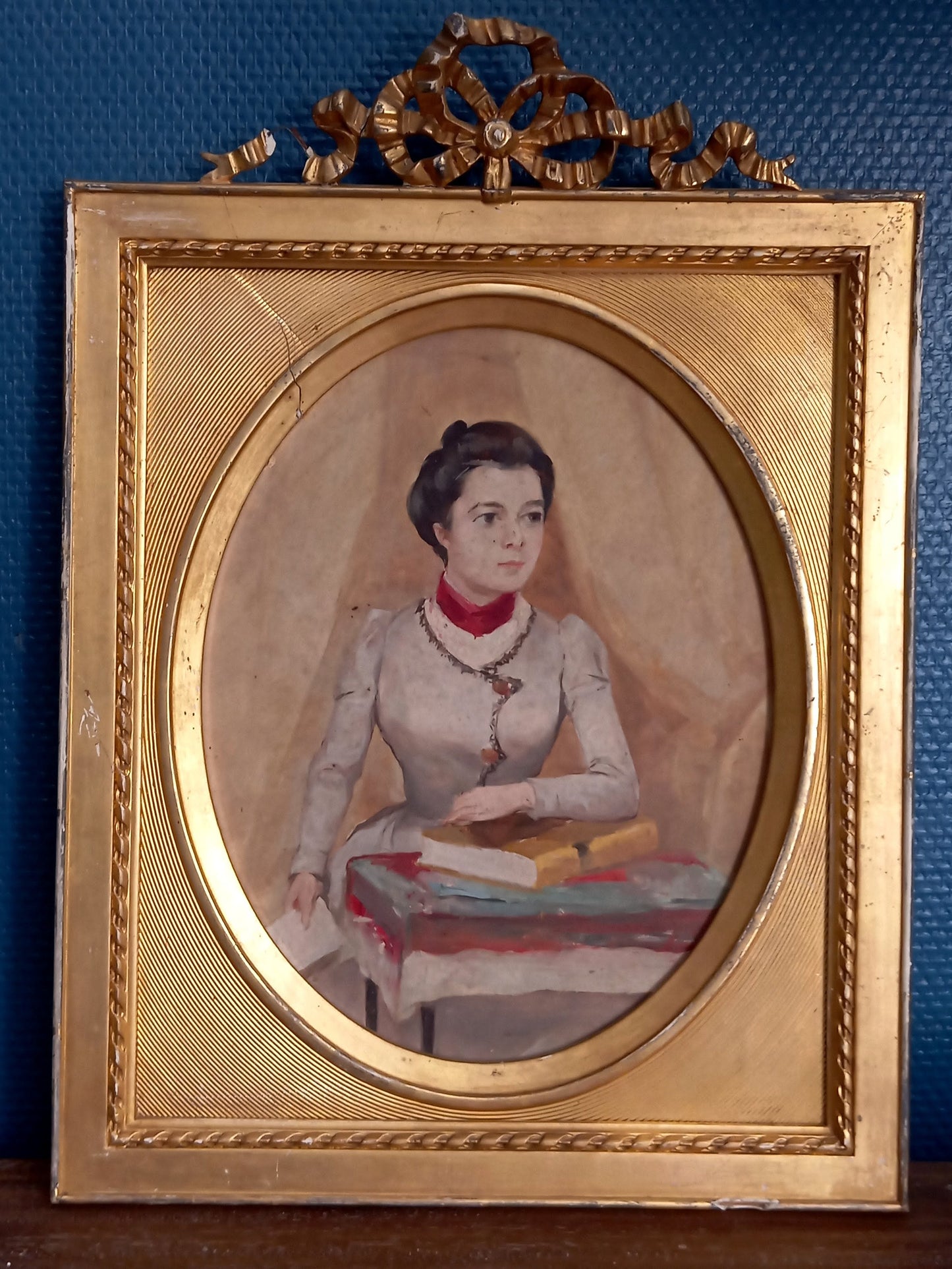 Portrait of an elegant woman holding a book