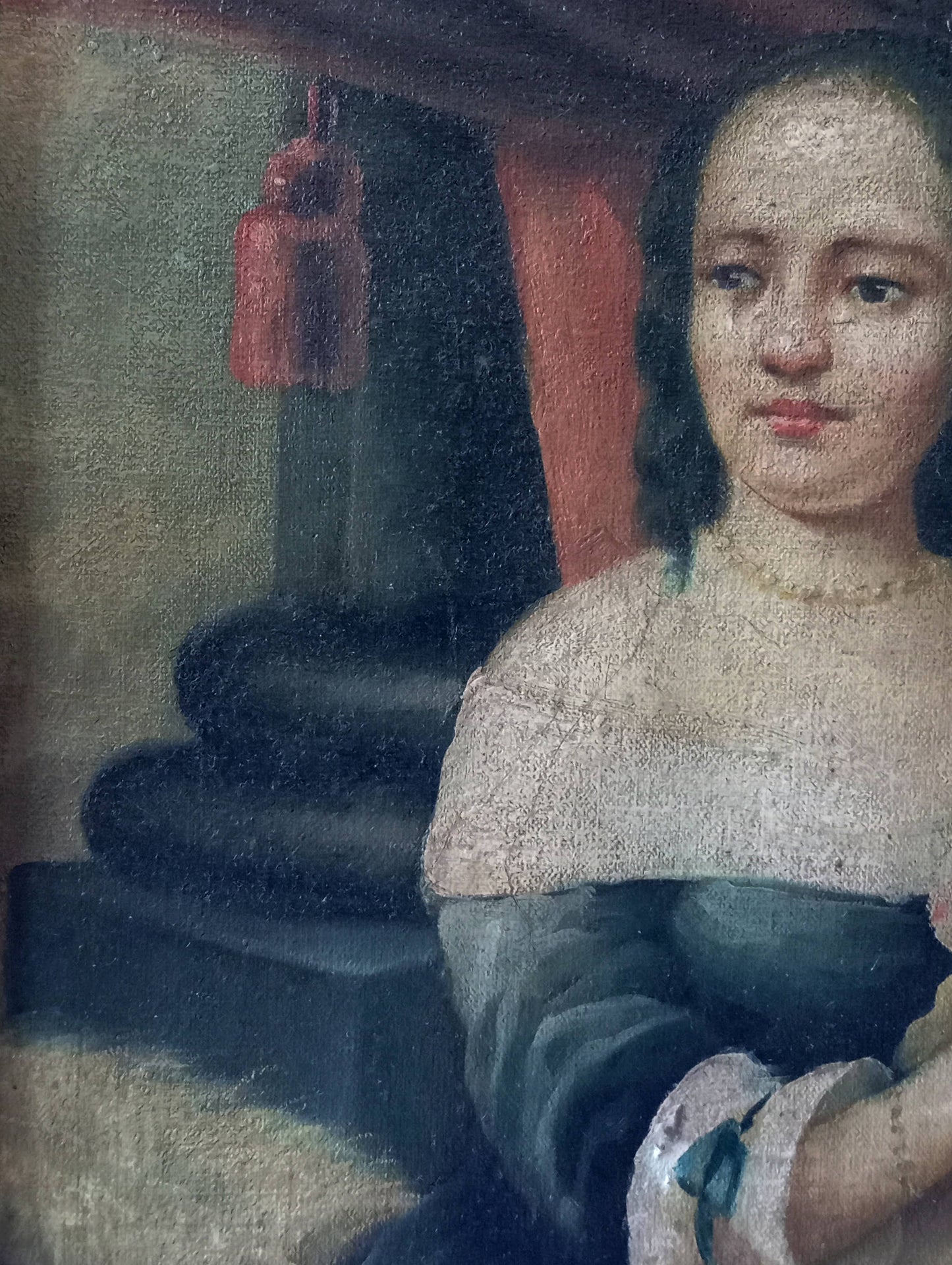 Portrait of a mother carrying her child