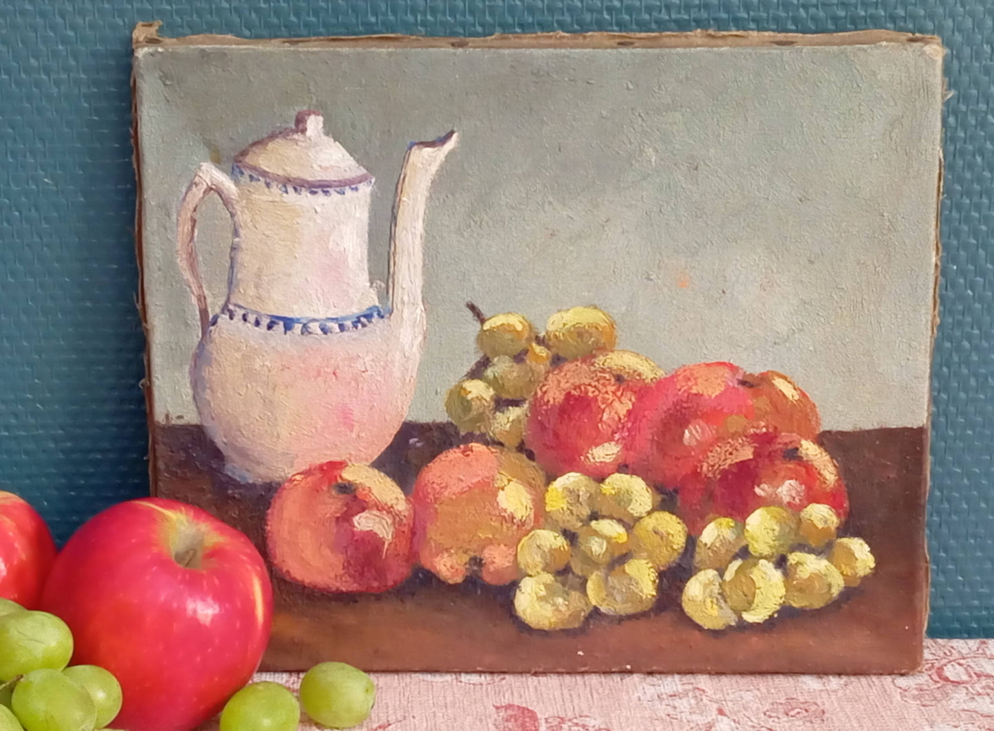 Small still life. Teapot and fruits