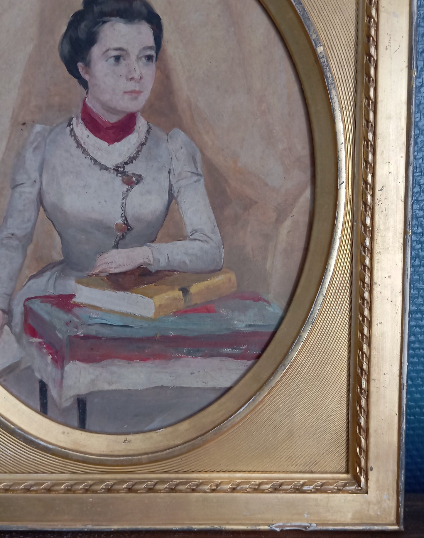 Portrait of an elegant woman holding a book
