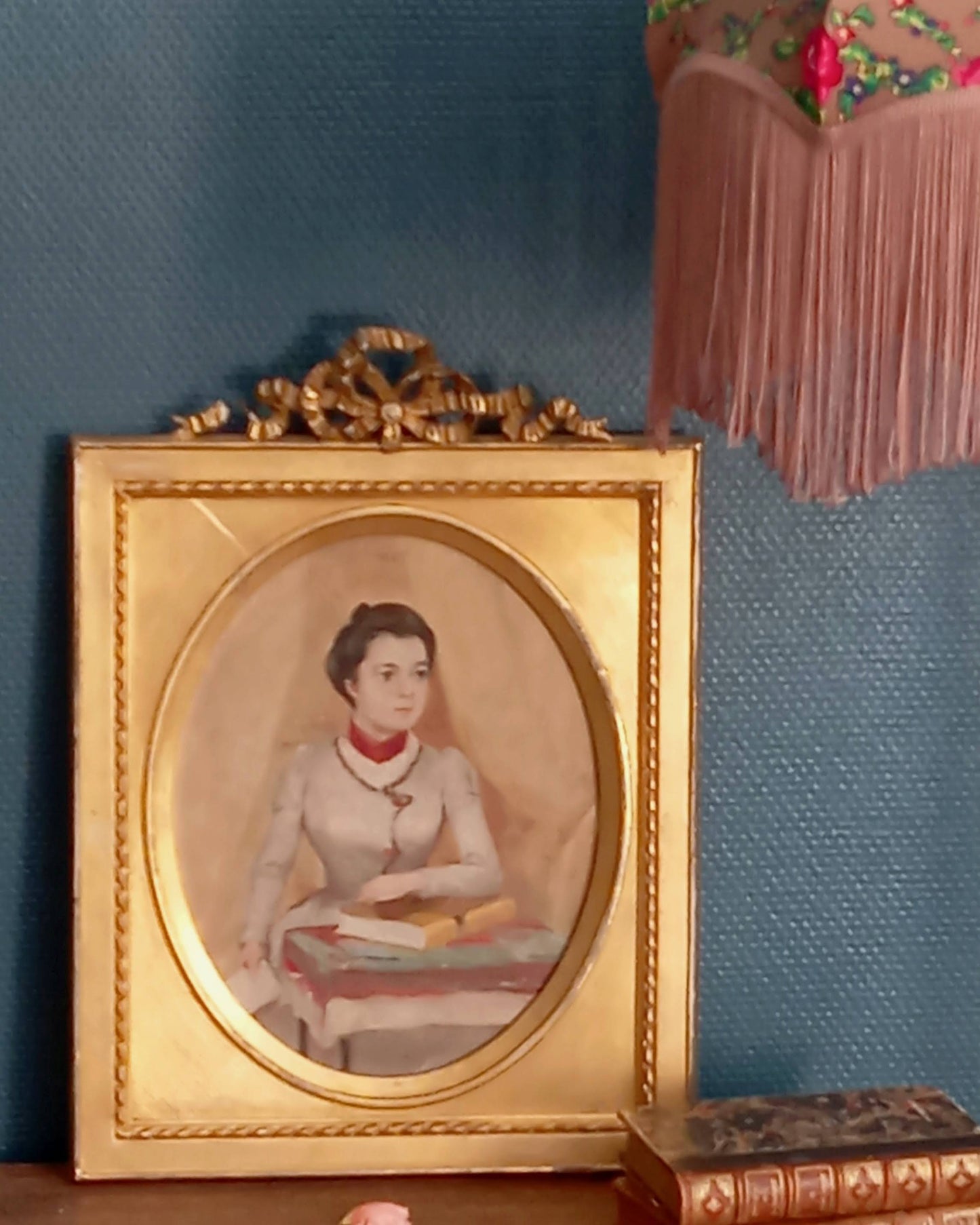 Portrait of an elegant woman holding a book
