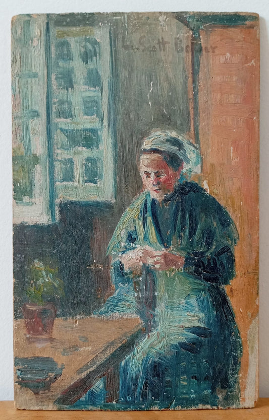 Portrait d'une femme en train de coudre