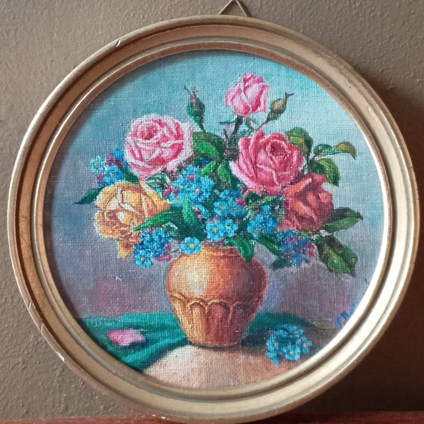 Small still life. Bouquet of roses in an earthenware vase