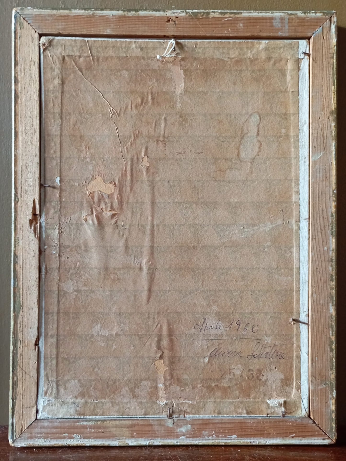 Portrait of a young woman with a bun reading