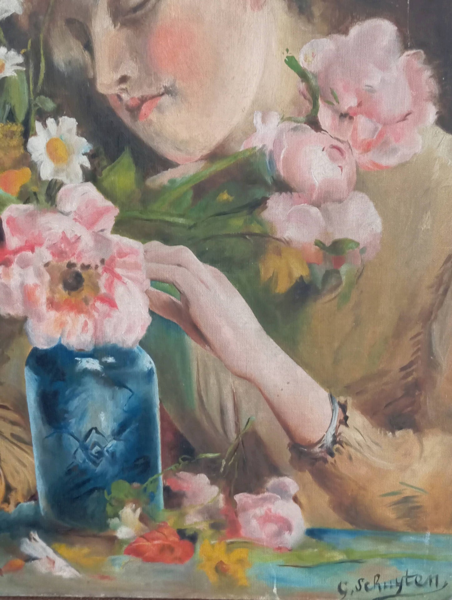 Portrait of a young woman making a bouquet
