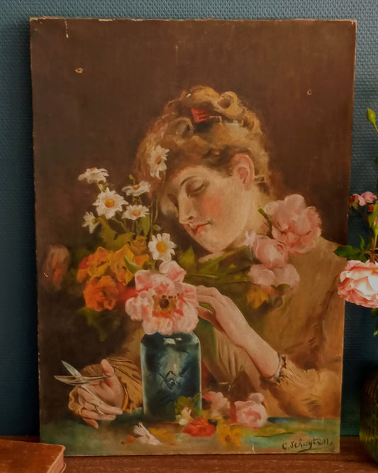 Portrait of a young woman making a bouquet
