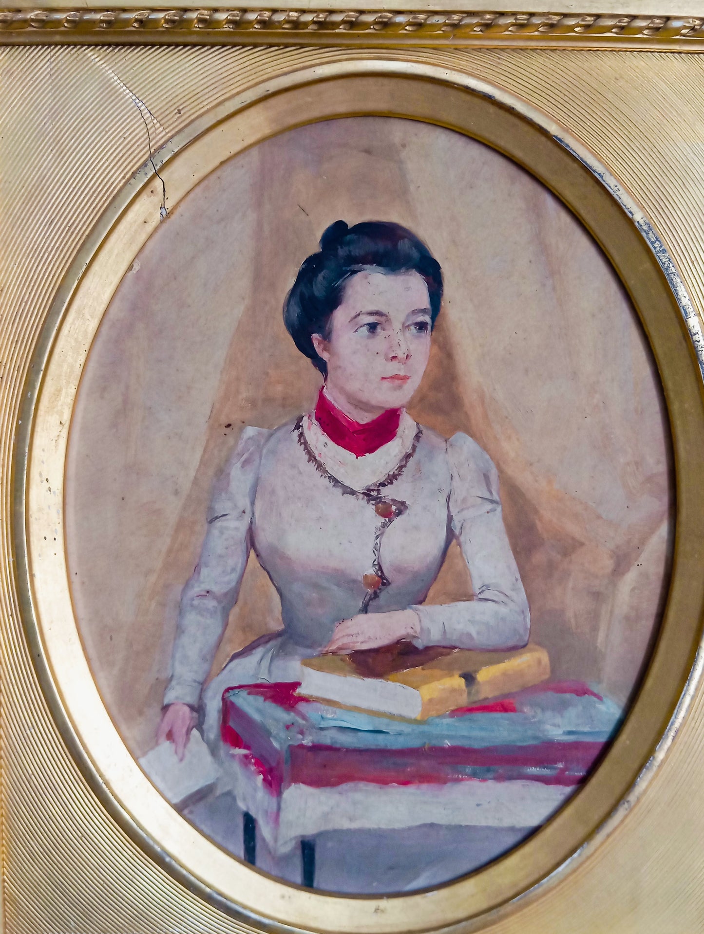 Portrait of an elegant woman holding a book