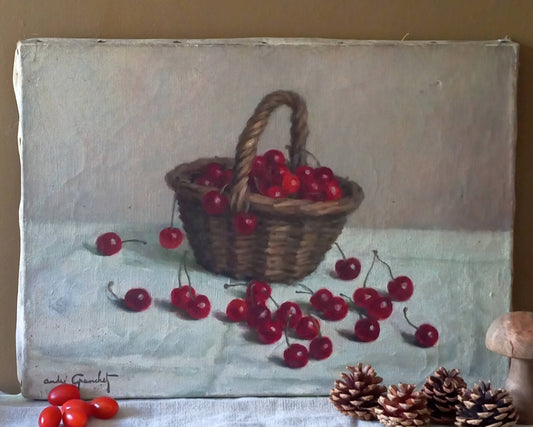Nature morte. Cerises dans un panier