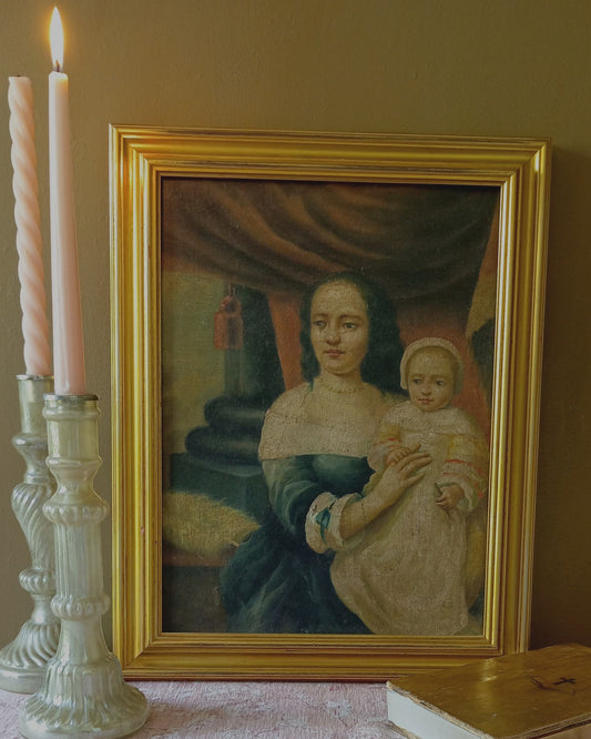 Portrait of a mother carrying her child